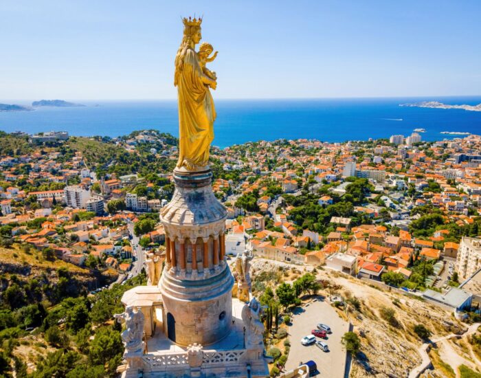 The,Aerial,View,Of,Basilique,Notre-dame-de-la-garde,In,Marseille,,A,Port